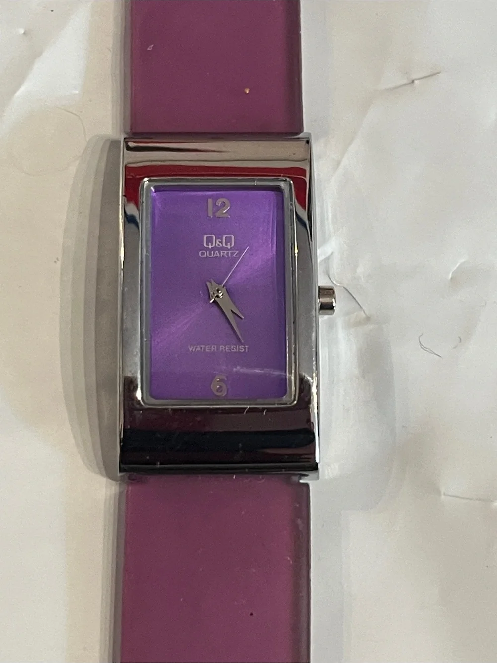 G& G watch with purple rubber band, good cond